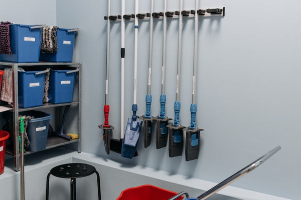 Janitorial accessories neatly arranged, ready for use