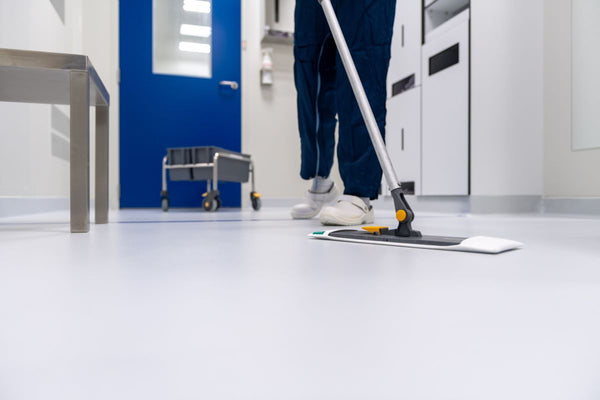 Cleaning staff safely using advanced cleaning equipment
