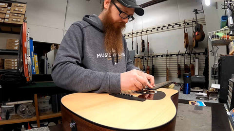 Adjusting the truss rod on a Martin Road Series acoustic guitar