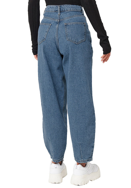 Back view of model wearing dark blue high-waist loose denim mom jeans