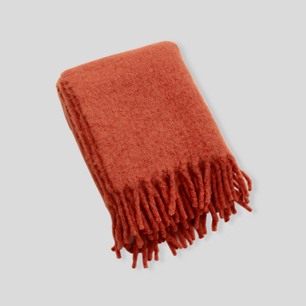 Alpaca throw rug in Rust