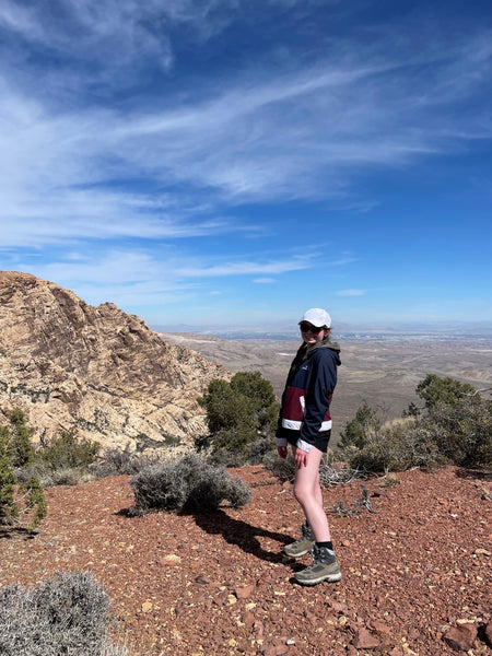 Mulrooney learning about the geology of Death Valley in a field course, Spring 2022