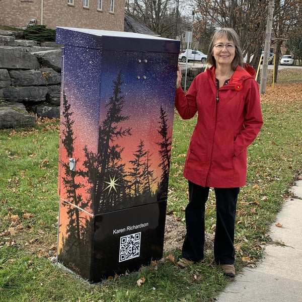 Karen Richardson beside her public art installation