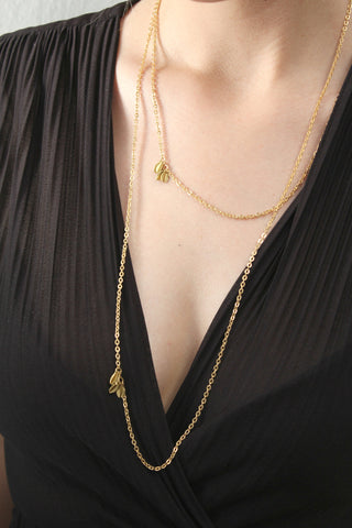 Delicate long gold chain necklace