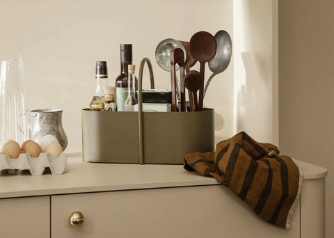 photo of olive grib toolbox on a kitchen bench