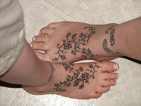 Couple tattoos henna style
