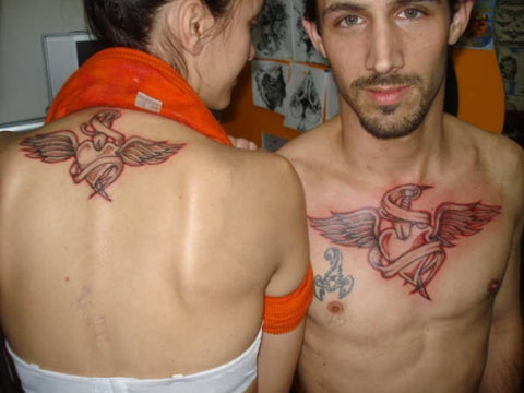 Couple tattoos winged hearts