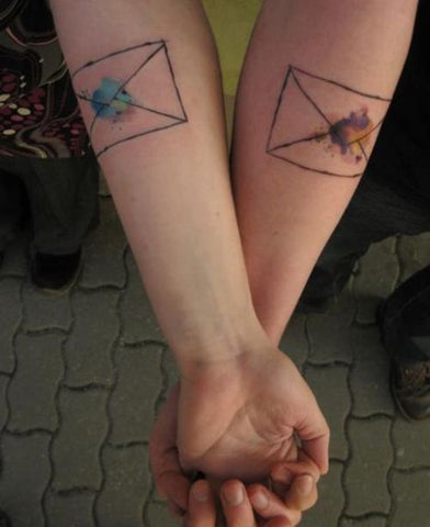 Couple tattoos letters