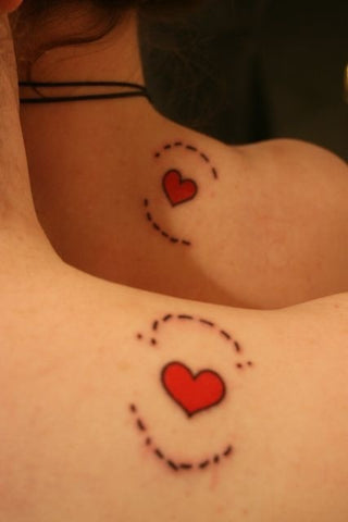 couple tattoos hearts