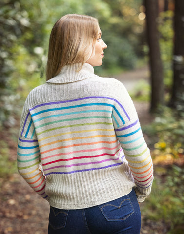 Sarah wears the Minimalist Rainbow pullover