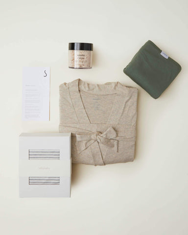 Solly mama gift set with a Flax bath robe, bath salts, Solly Swaddle, and Solly Wrap