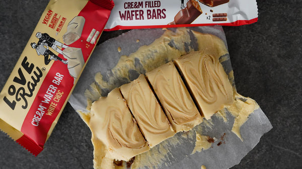 Overhead photo of the white wafer fudge cut into slices and sitting next to a White Choc Cre&m® Wafer Bar.