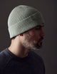 man wearing light green cotton beanie from AETHER Apparel