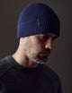 man wearing dark blue cotton beanie from AETHER Apparel