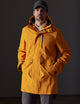 Man wearing orange rain jacket from AETHER Apparel