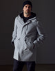 Man wearing grey rain jacket from AETHER Apparel