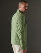 Man wearing green jacket from AETHER Apparel