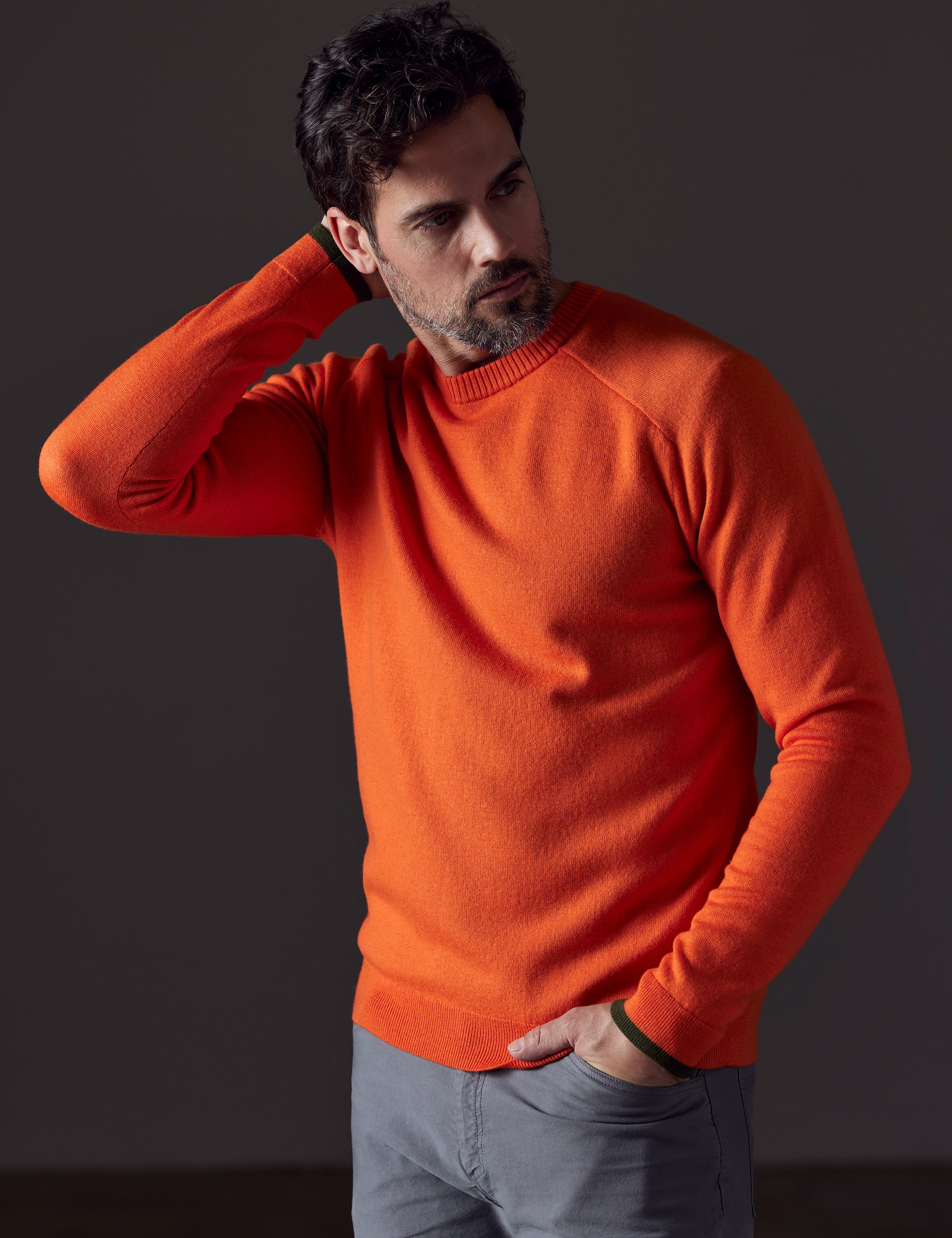 man wearing orange sweater from AETHER Apparel