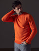 man wearing orange sweater from AETHER Apparel