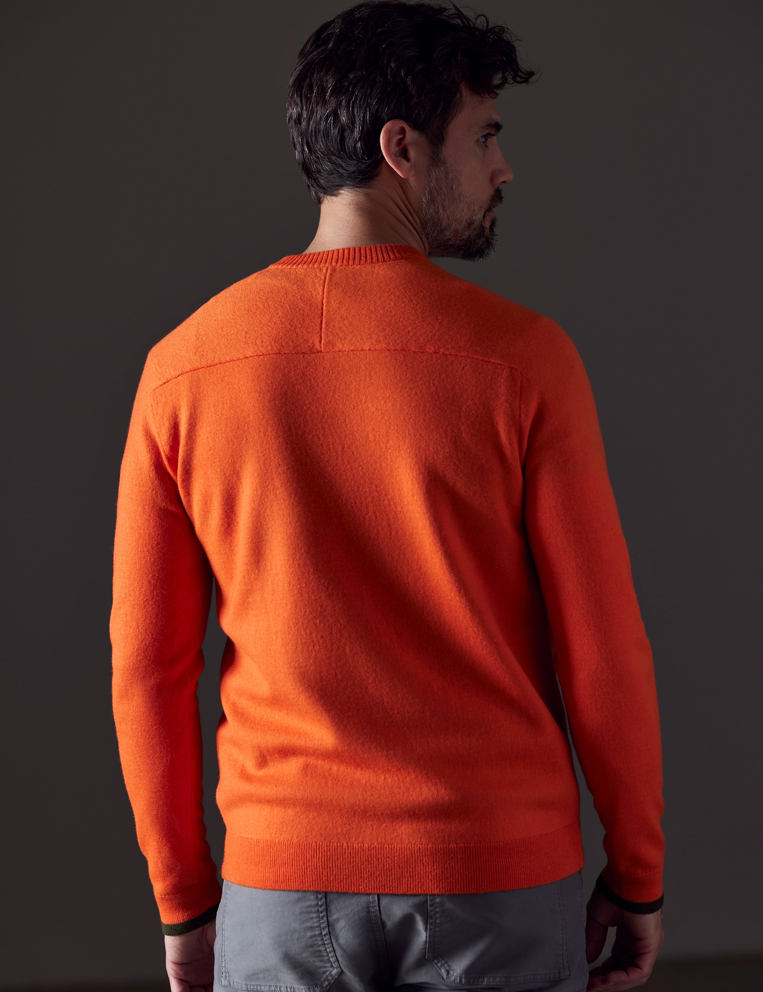 man wearing orange sweater from AETHER Apparel