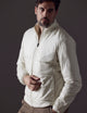 Man wearing white Eco Insulated Jacket from AETHER Apparel