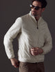 Man wearing white Eco Insulated Jacket from AETHER Apparel