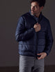 Man wearing blue Eco Insulated Jacket from AETHER Apparel