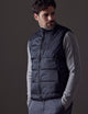 Man wearing black Eco Insulated Vest from AETHER Apparel