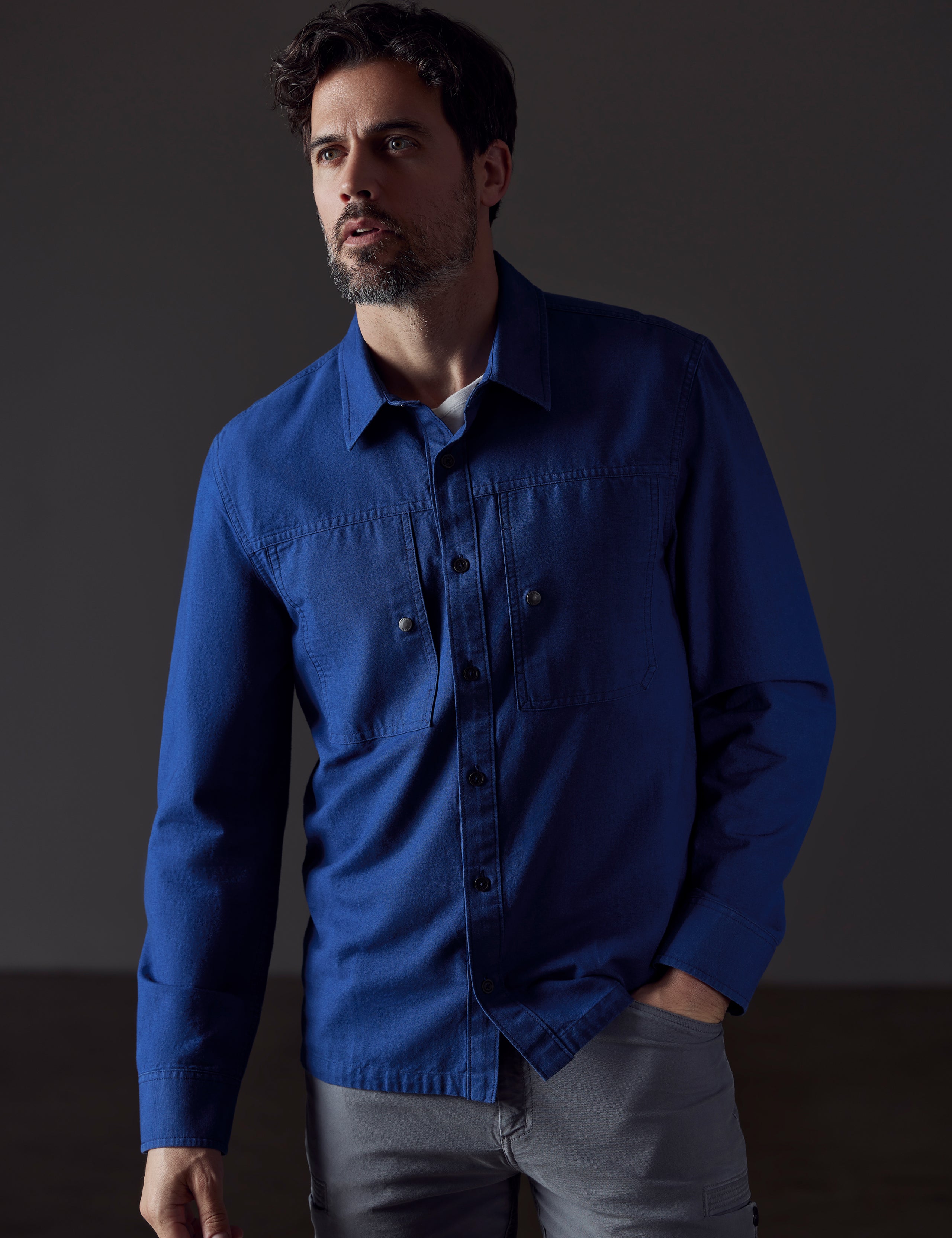 man wearing dark blue button-down from AETHER Apparel