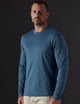 Man wearing blue organic cotton tee from AETHER Apparel