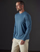 Man wearing blue organic cotton tee from AETHER Apparel