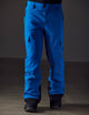 man wearing blue snow pants from AETHER Apparel