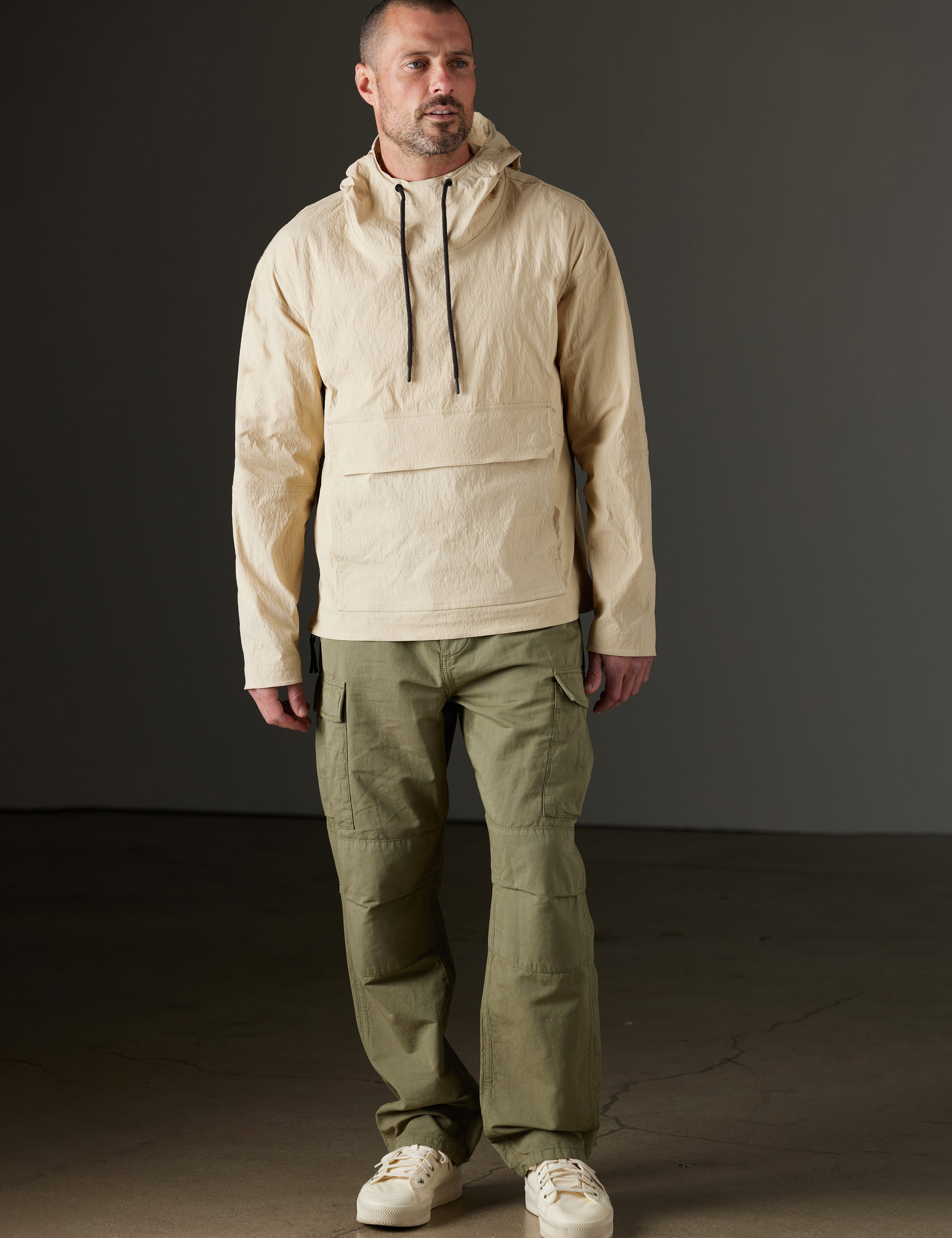 Man wearing beige anorak from AETHER Apparel