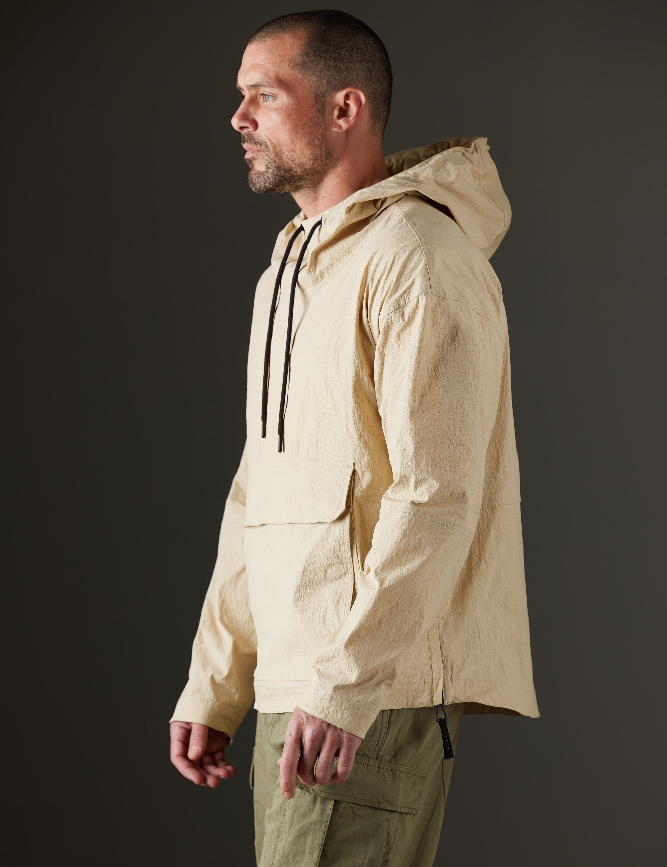 Man wearing beige anorak from AETHER Apparel