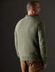 Man wearing green sweater from AETHER Apparel