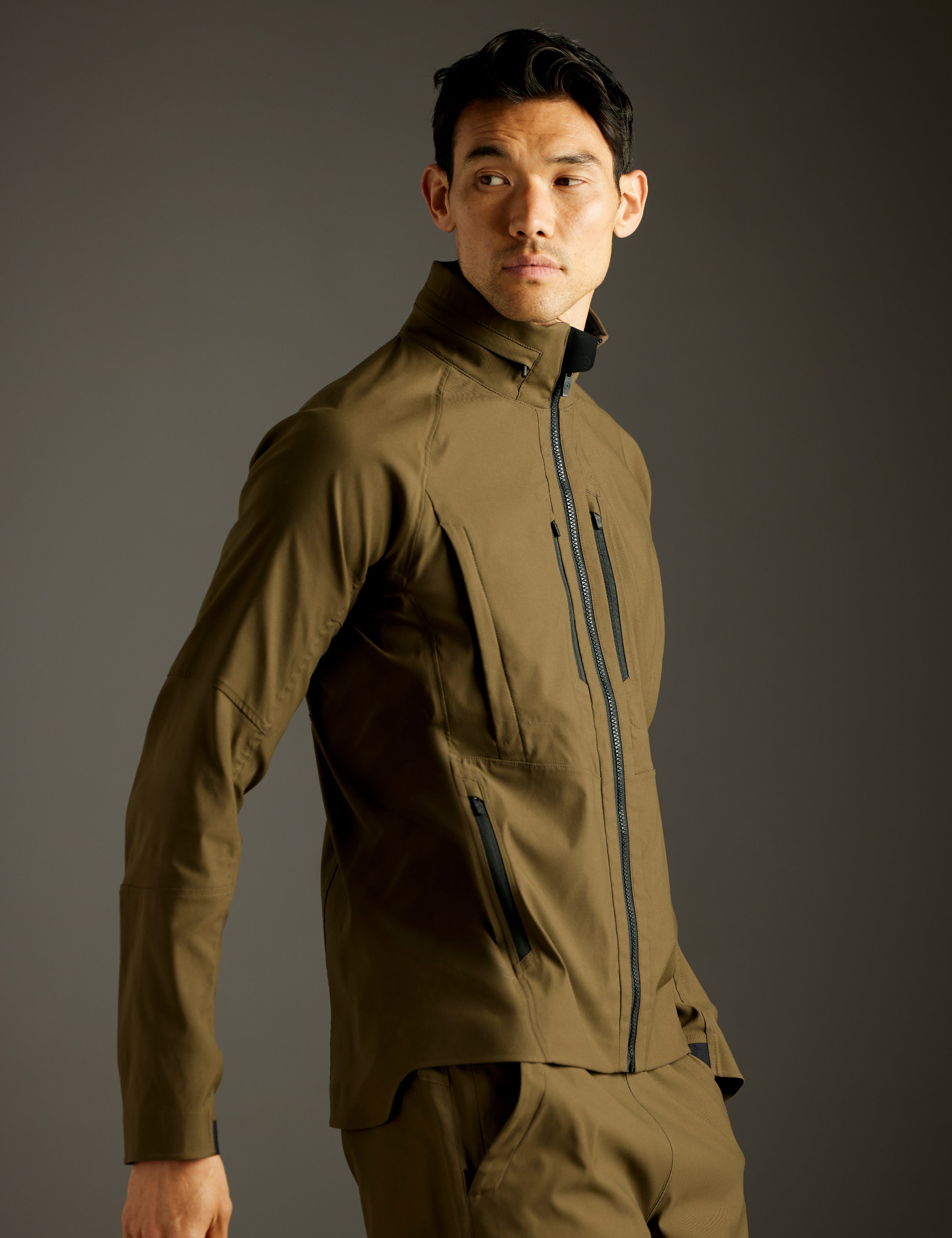 man wearing green jacket from AETHER Apparel