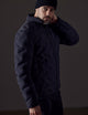 Man wearing black insulated jacket from AETHER Apparel