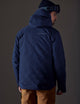 man wearing blue insulated jacket from AETHER Apparel