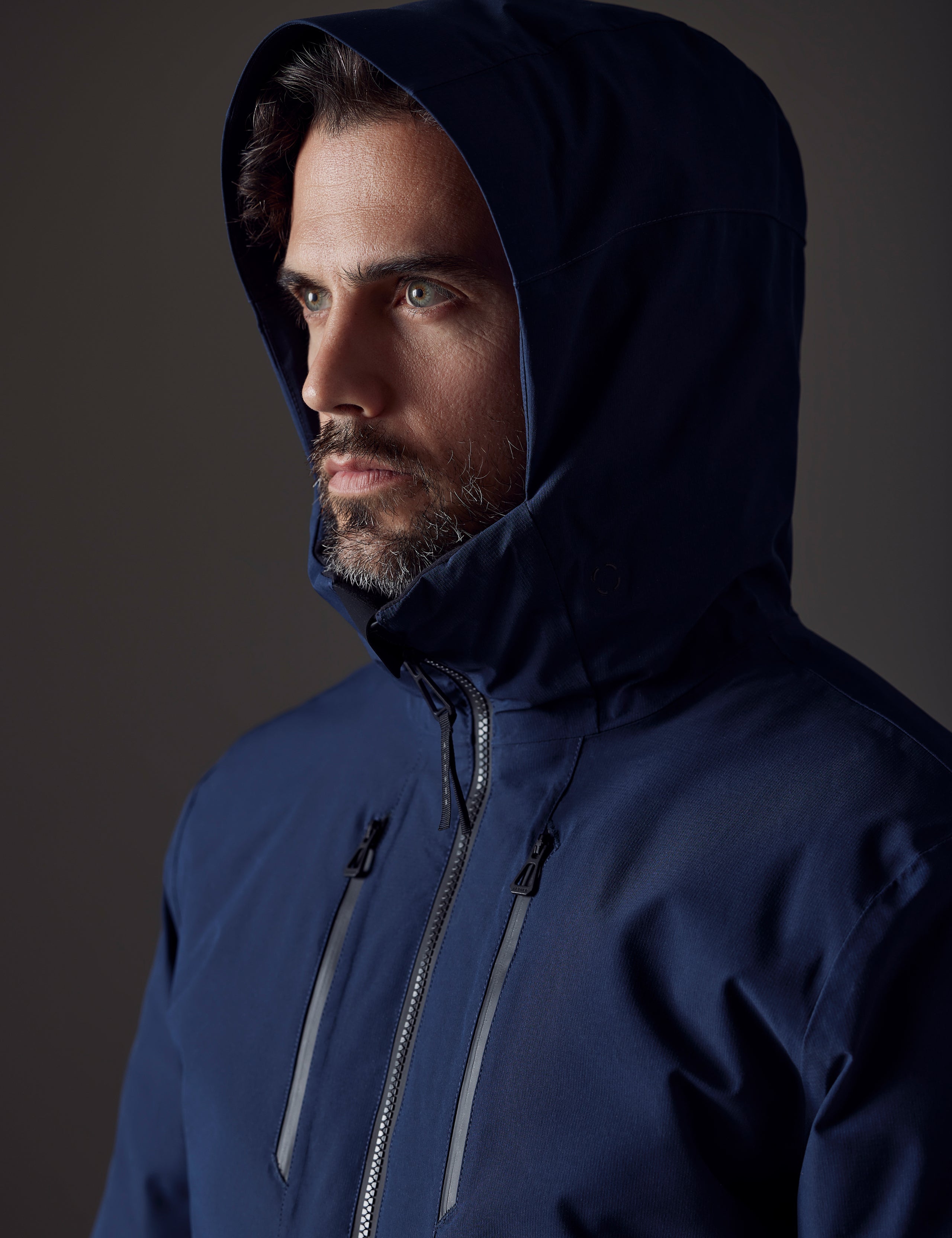 man wearing blue insulated jacket from AETHER Apparel