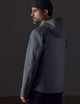 Man wearing grey technical jacket from AETHER Apparel