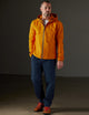 man wearing orange jacket from AETHER Apparel