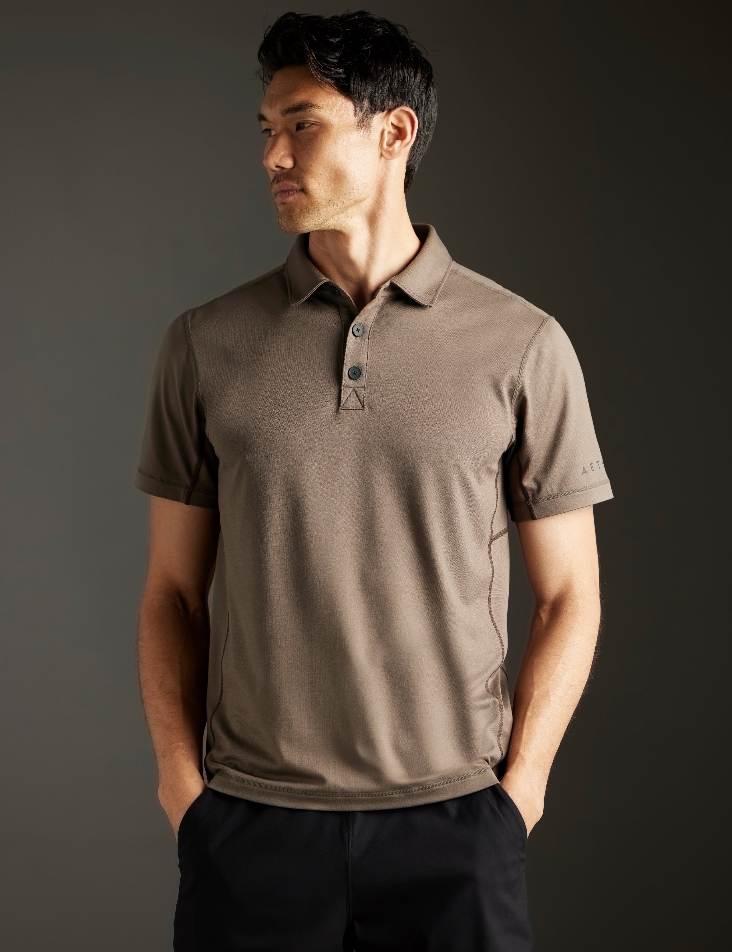 man wearing light brown polo from AETHER Apparel