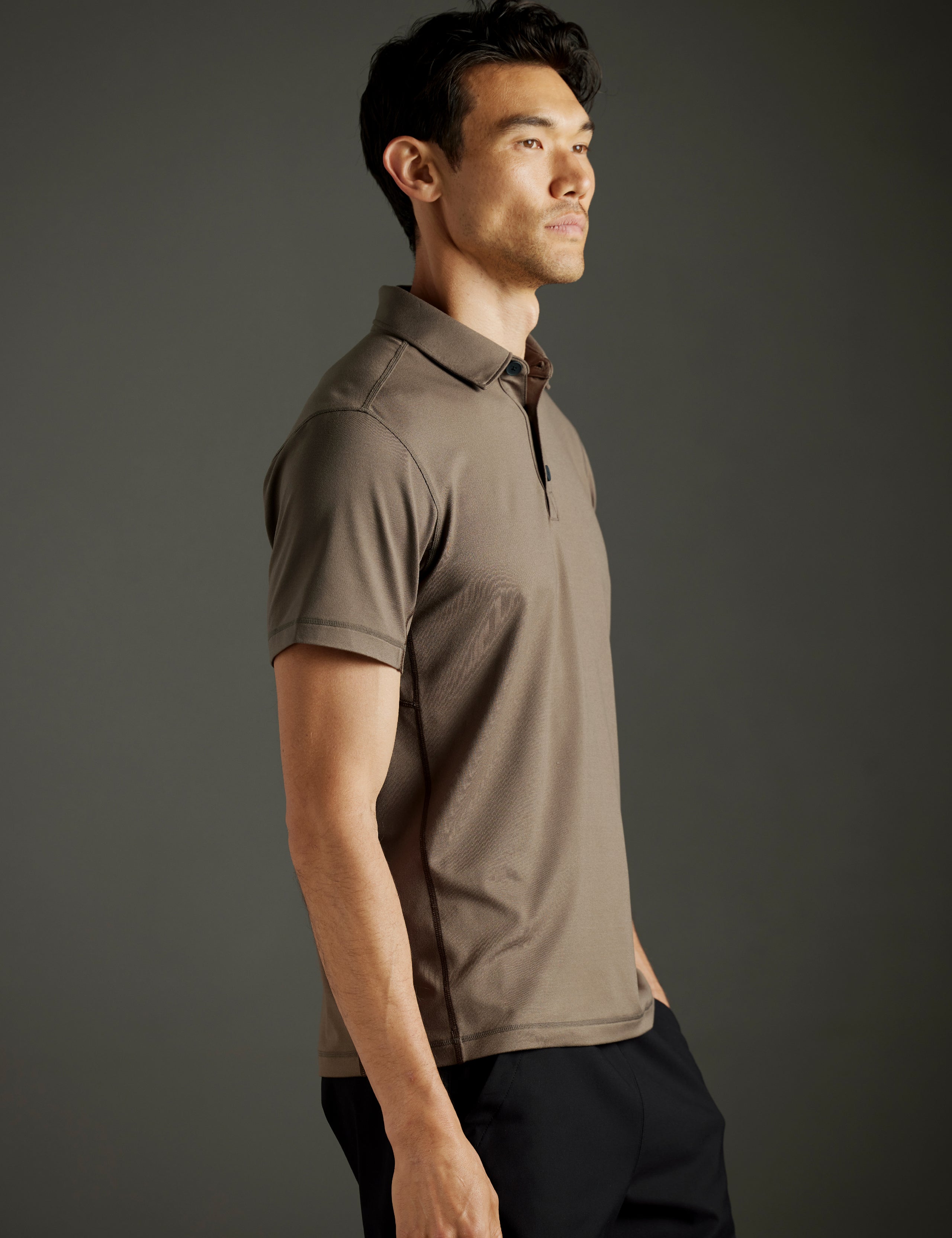 man wearing light brown polo from AETHER Apparel