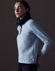 Woman wearing light blue Align Pullover from AETHER Apparel