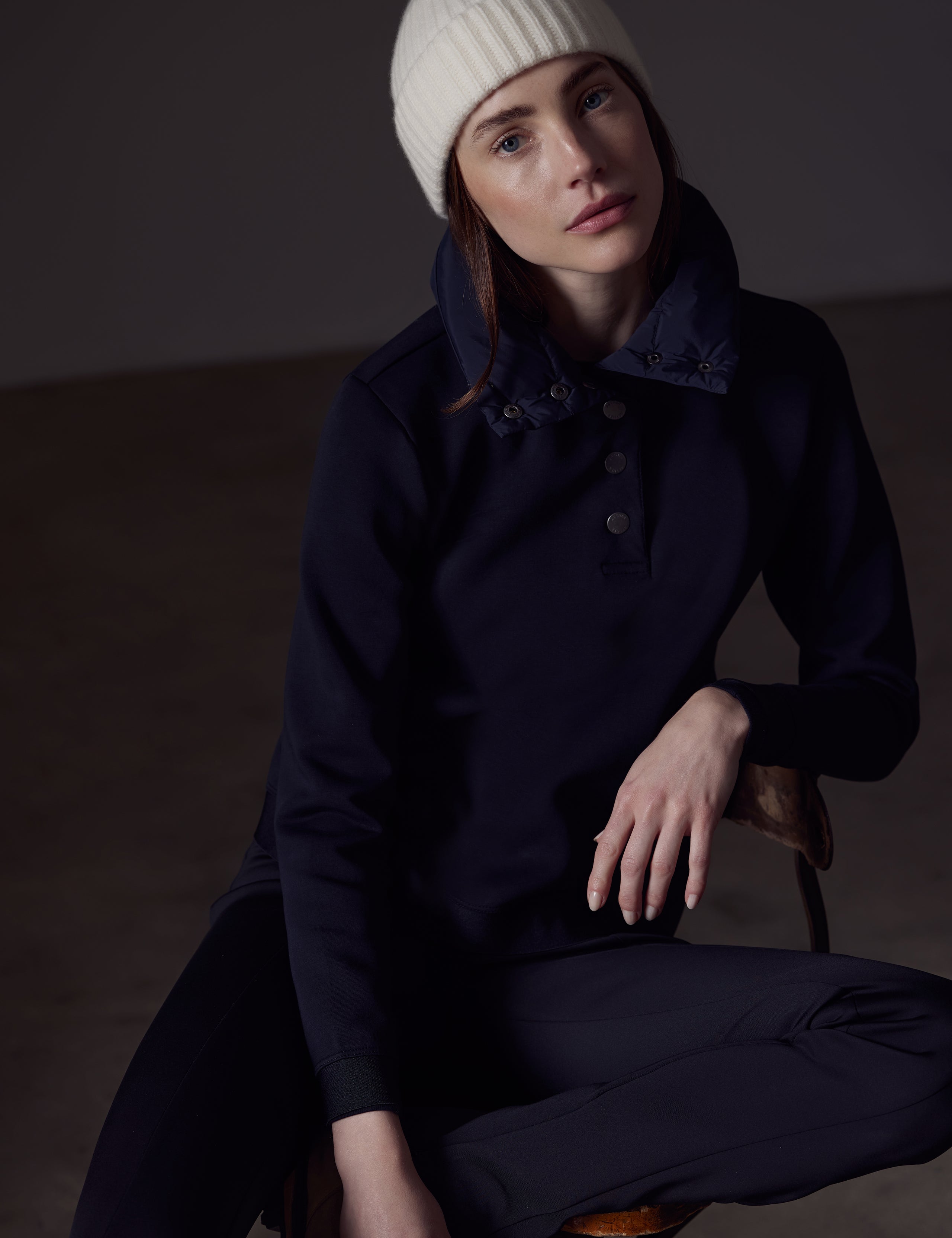 Woman wearing black Align Pullover from AETHER Apparel