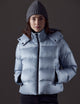 Woman wearing blue puffer jacket from AETHER Apparel