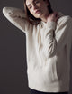 Woman wearing white Ava Cashmere Hooded Sweater