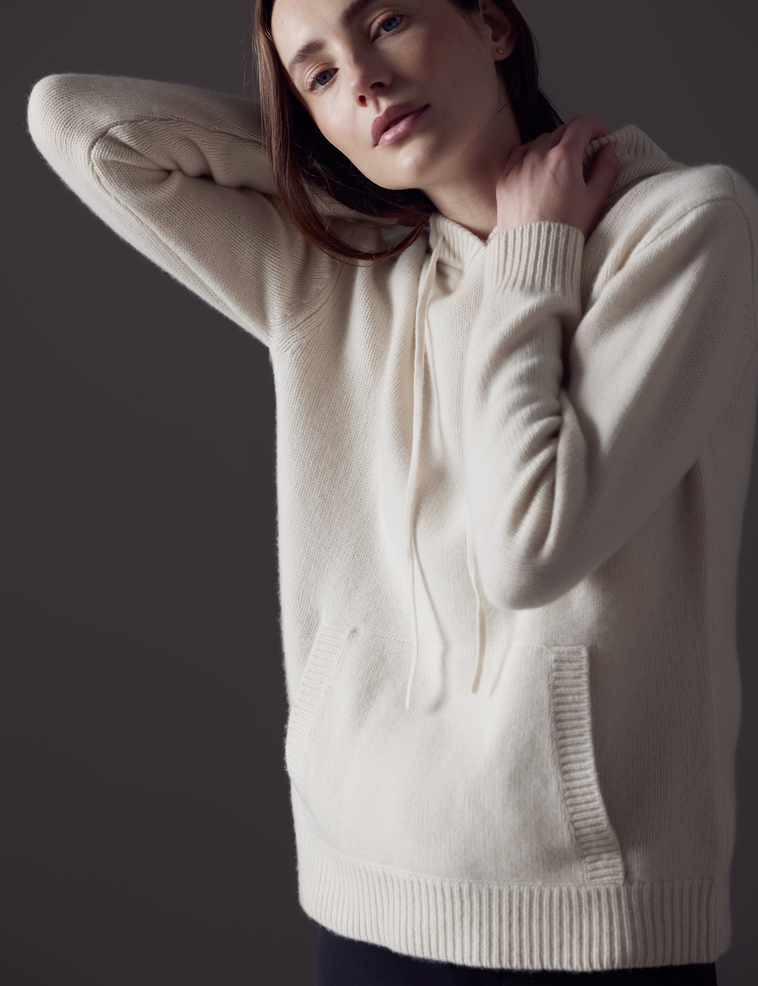 Woman wearing white Ava Cashmere Hooded Sweater