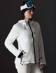 woman wearing white snow jacket from AETHER Apparel