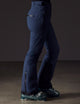 woman wearing dark blue snow pant from AETHER Apparel